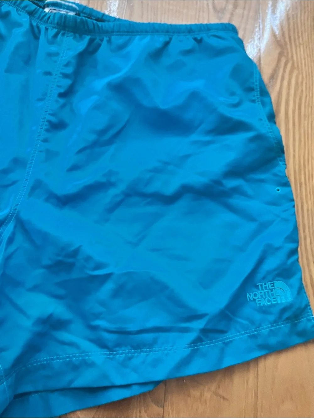 The North Face womens running shorts size medium green